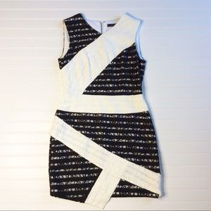 BGBGMaxAzria Black & White Fitted MiNI Lace Dress. Item# 0071